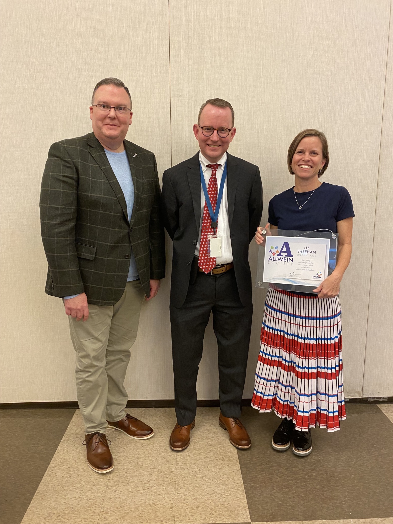 Liz Sheehan with PSBA CEO Nathan Mains and New Hope-Solebury superintendent Charles Lentz